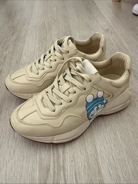 Gucci Beige Casual Sneakers with Cute Blue Character Graphic